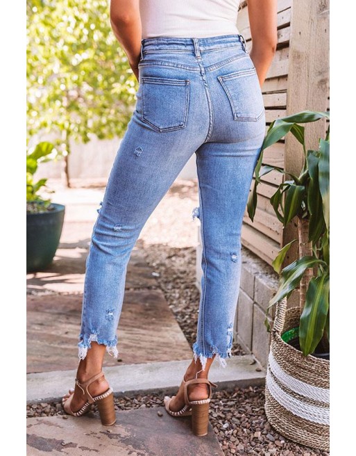 High Waist Distressed Relaxed Skinn  in Light Wash